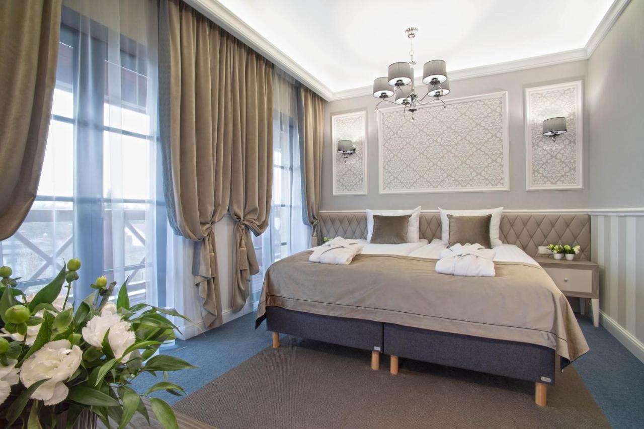 Boutique Odyseja & Spa Цехоцинек Екстер'єр фото A bedroom in the hotel