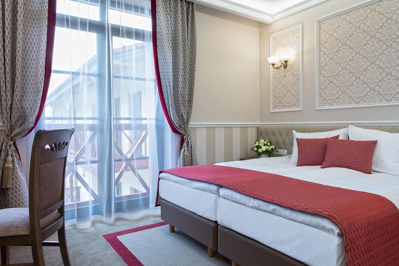 Boutique Odyseja & Spa Цехоцинек Екстер'єр фото A room at the hotel