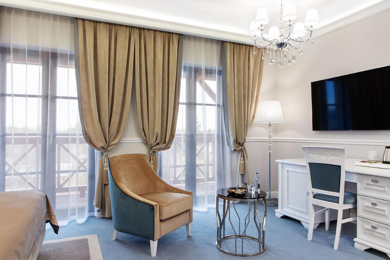 Boutique Odyseja & Spa Цехоцинек Екстер'єр фото A room at the hotel