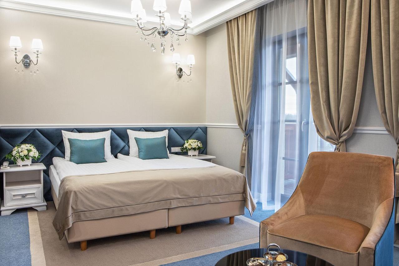 Boutique Odyseja & Spa Цехоцинек Екстер'єр фото A room at the hotel