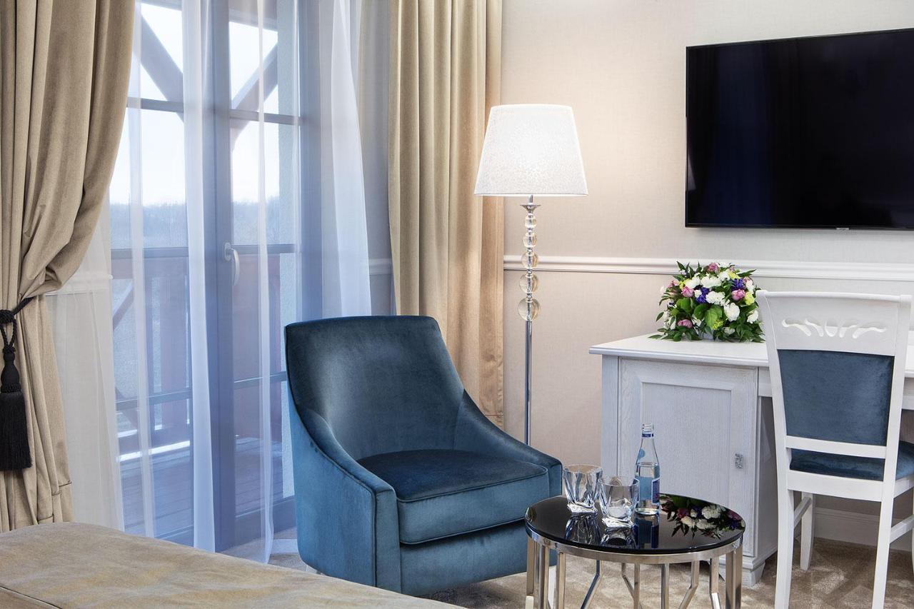 Boutique Odyseja & Spa Цехоцинек Екстер'єр фото A room at the hotel